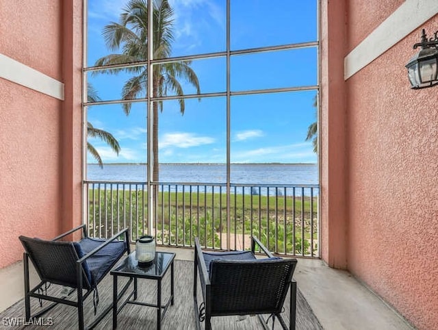 sunroom with a water view