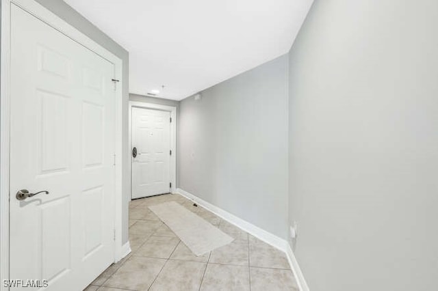 interior space featuring light tile patterned floors