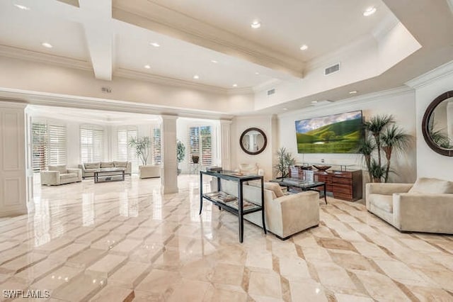 tiled living room featuring beam ceiling, crown molding, and decorative columns