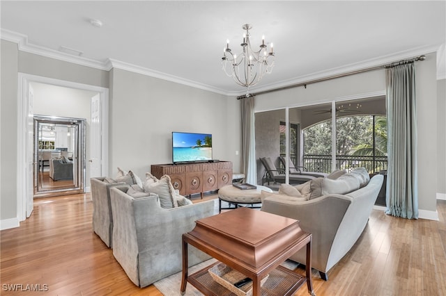 living room featuring a notable chandelier, light hardwood / wood-style floors, and crown molding