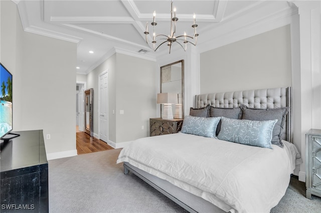 carpeted bedroom with coffered ceiling, an inviting chandelier, and crown molding