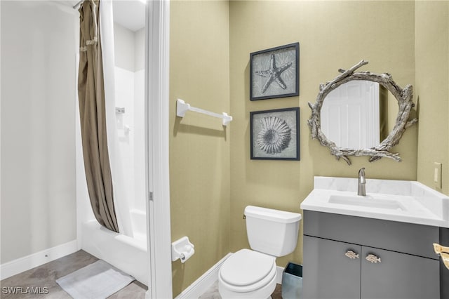 full bathroom featuring shower / tub combo with curtain, toilet, vanity, and tile patterned floors