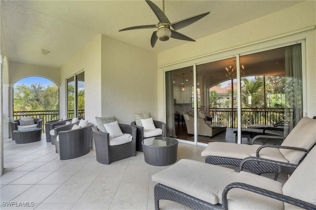 view of patio with ceiling fan and outdoor lounge area