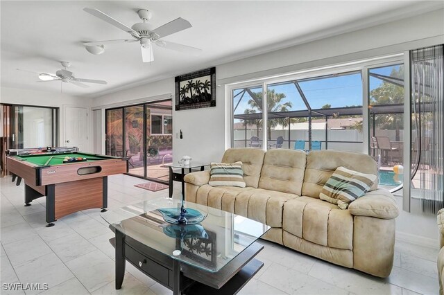 recreation room with ceiling fan, pool table, and light tile patterned floors