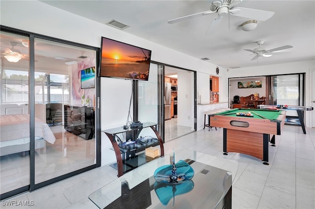 playroom featuring pool table, light tile patterned floors, and ceiling fan