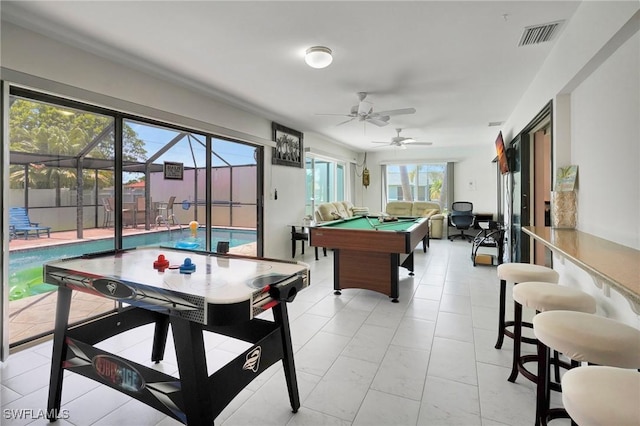 playroom with light tile patterned flooring, pool table, and ceiling fan