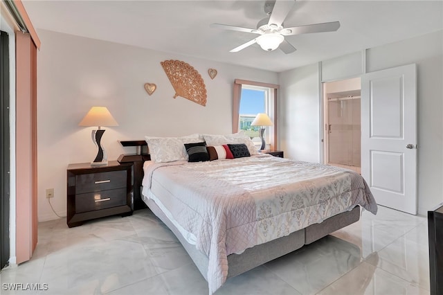 tiled bedroom featuring a closet and ceiling fan