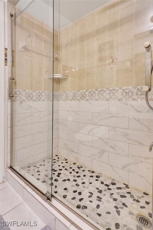 bathroom with an enclosed shower