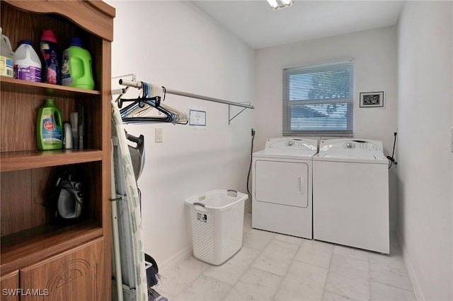 laundry room with separate washer and dryer