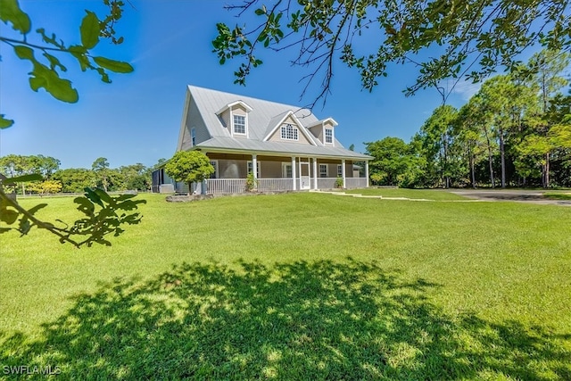 view of front of house featuring a front yard and a porch