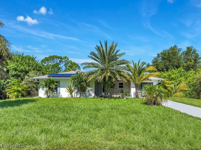 view of front facade with a front lawn