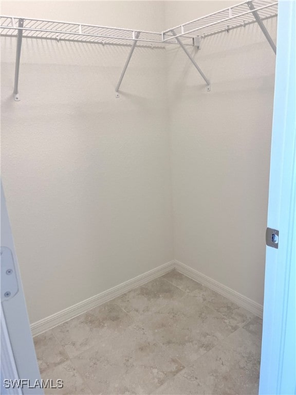 walk in closet featuring tile patterned floors