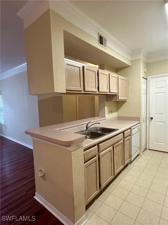 kitchen with light brown cabinets, white dishwasher, ornamental molding, light hardwood / wood-style floors, and sink