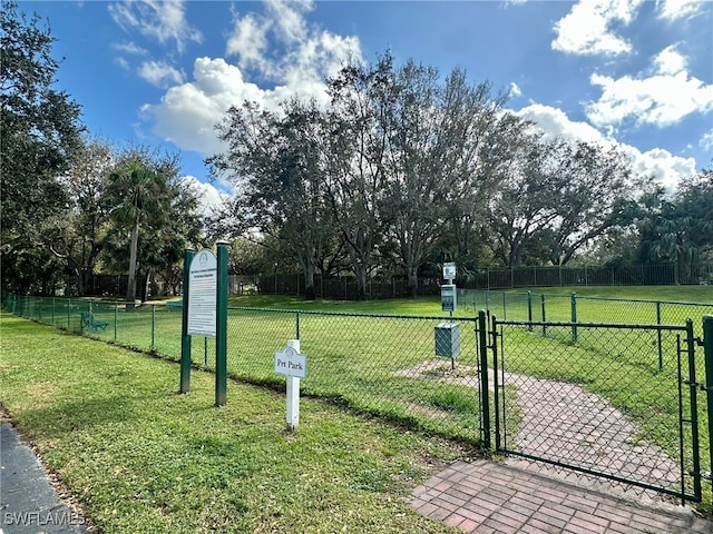 view of home's community with a lawn