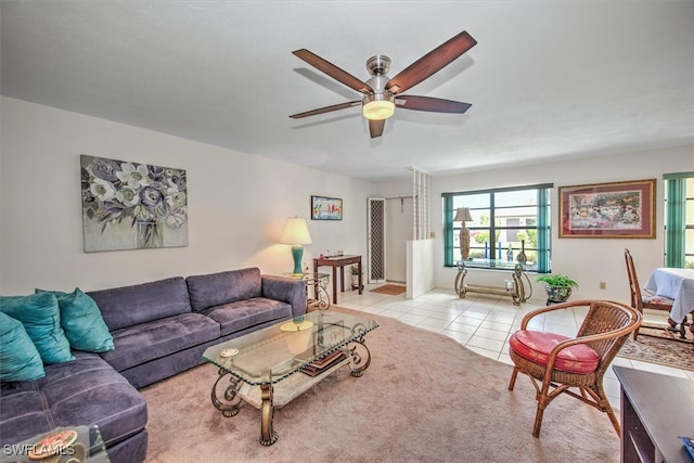 living room with light tile patterned floors and ceiling fan