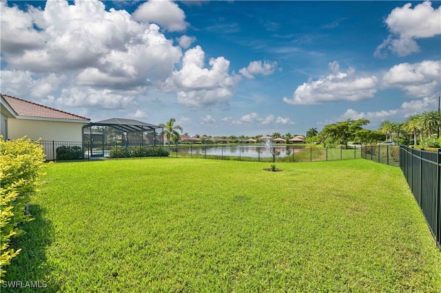 view of yard featuring a gazebo and a water view