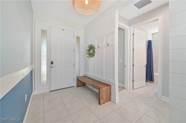 view of tiled foyer entrance