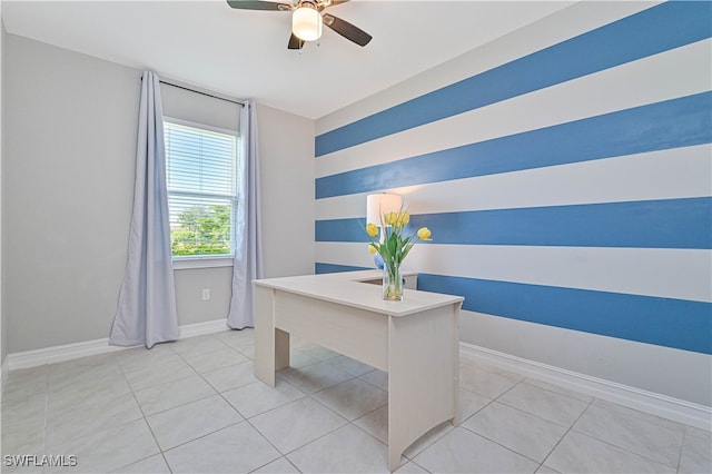 tiled office space featuring ceiling fan