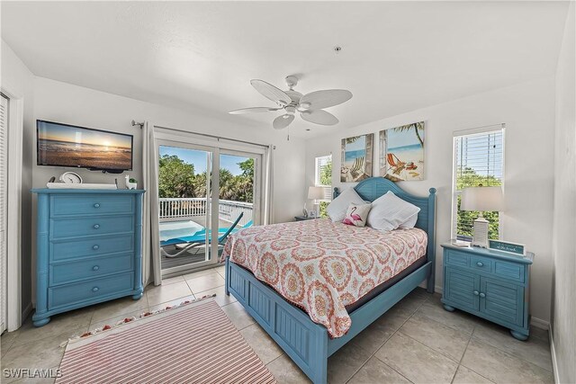4501 Seair Ln, Upper Captiva, FL 33924 - bedroom featuring access to exterior, a ceiling fan, and light tile patterned floors