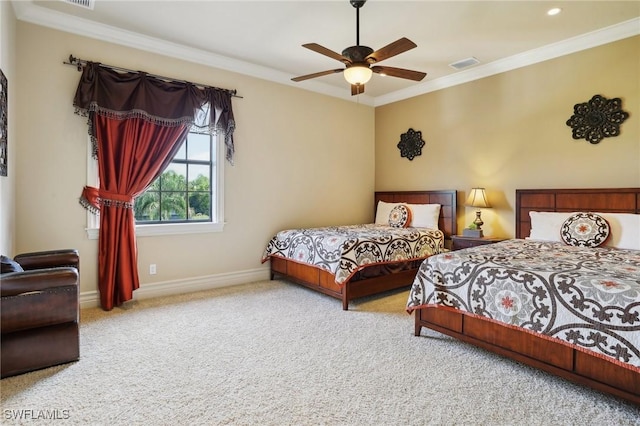 carpeted bedroom with crown molding and ceiling fan