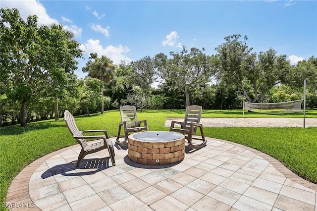 view of patio featuring a fire pit and volleyball court