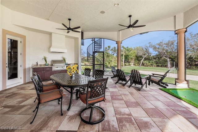 view of patio / terrace with stairway, a grill, outdoor dining space, and ceiling fan