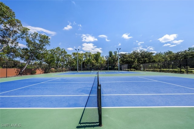 view of sport court with community basketball court and fence