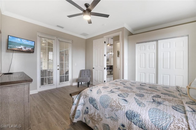 bedroom with hardwood / wood-style floors, a closet, access to outside, ceiling fan, and crown molding