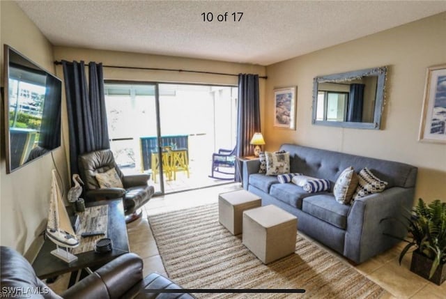 tiled living room with a textured ceiling