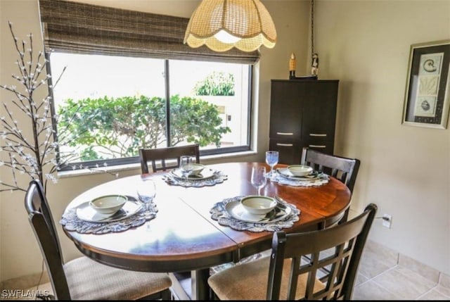 view of tiled dining space