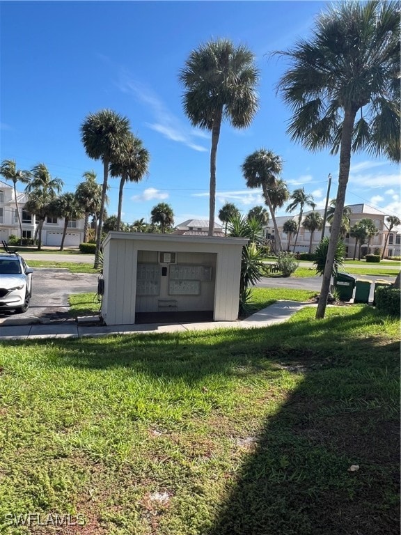 garage with a yard