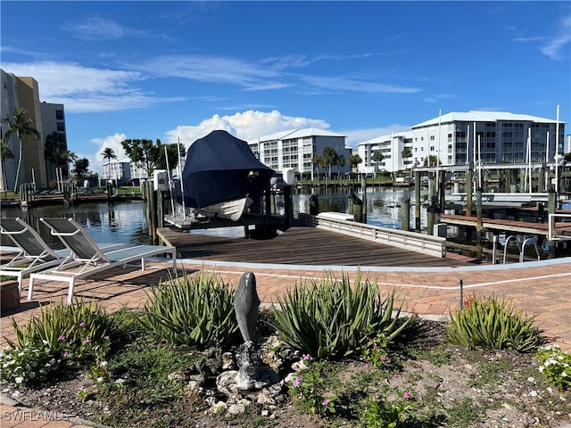 view of dock with a water view