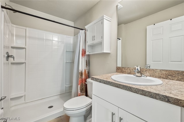 bathroom featuring tile patterned flooring, toilet, vanity, and a shower with curtain