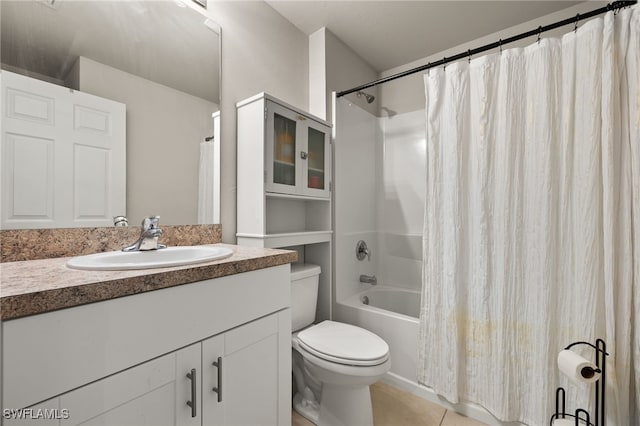 full bathroom with tile patterned floors, vanity, shower / bath combo, and toilet