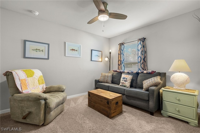 carpeted living room with ceiling fan