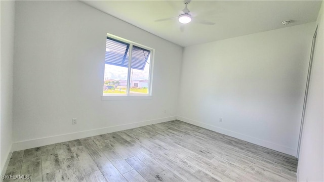 unfurnished room featuring ceiling fan and light hardwood / wood-style flooring