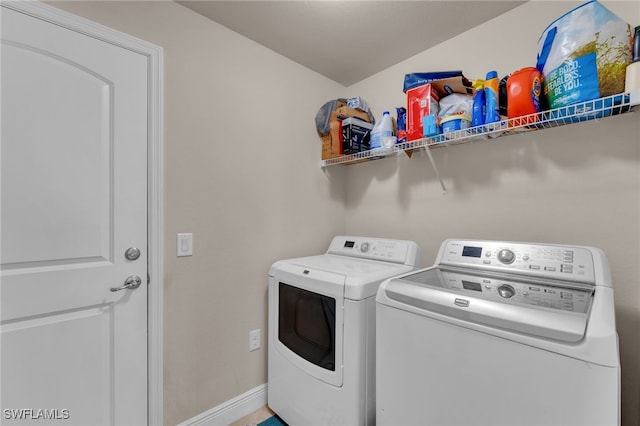 clothes washing area with independent washer and dryer