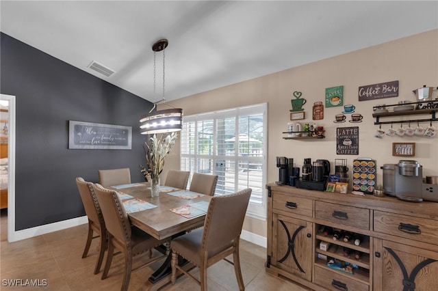 dining area featuring light tile patterned floors