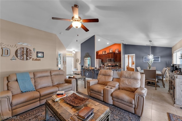 living room with light tile patterned flooring, ceiling fan, and high vaulted ceiling