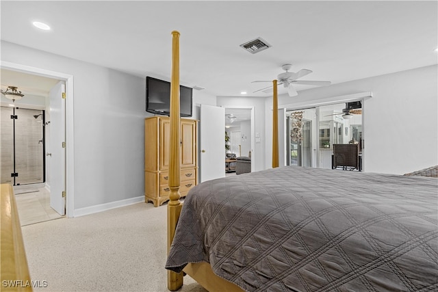 bedroom featuring ceiling fan, light tile patterned floors, ensuite bath, and access to exterior