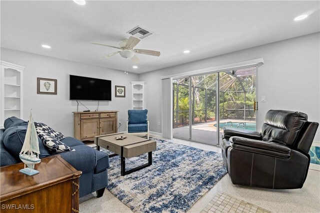 living room featuring ceiling fan and light carpet