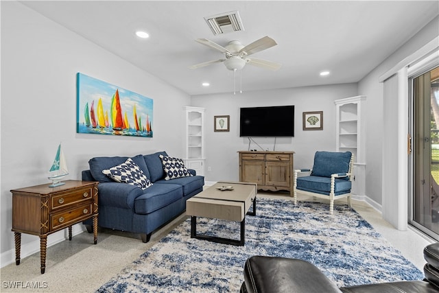 living room featuring ceiling fan