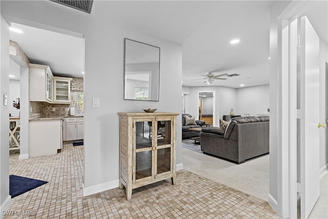 interior space featuring light tile patterned floors