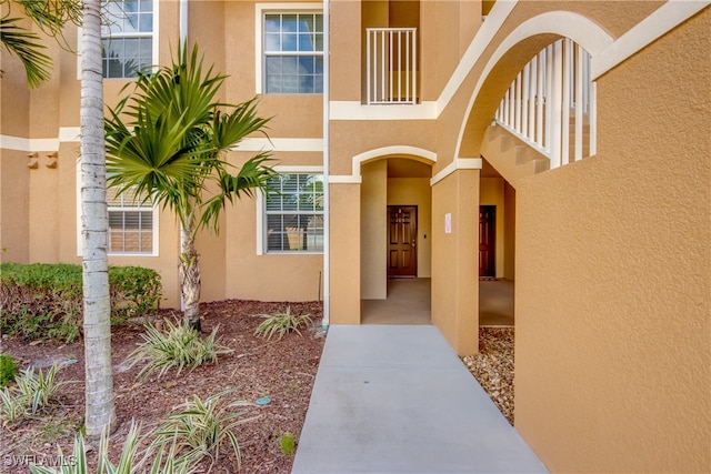 doorway to property with a balcony