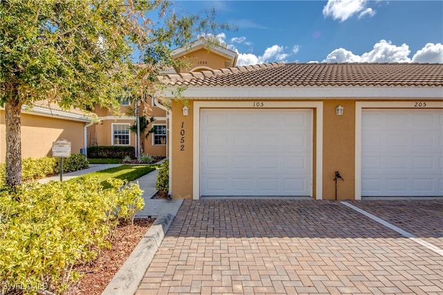 view of front of home featuring a garage