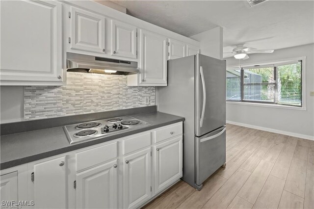 kitchen with ceiling fan, light wood-type flooring, white cabinets, and gas cooktop