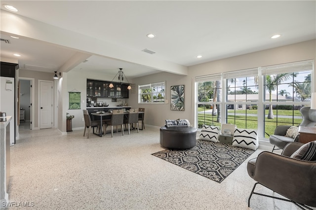 living room featuring plenty of natural light