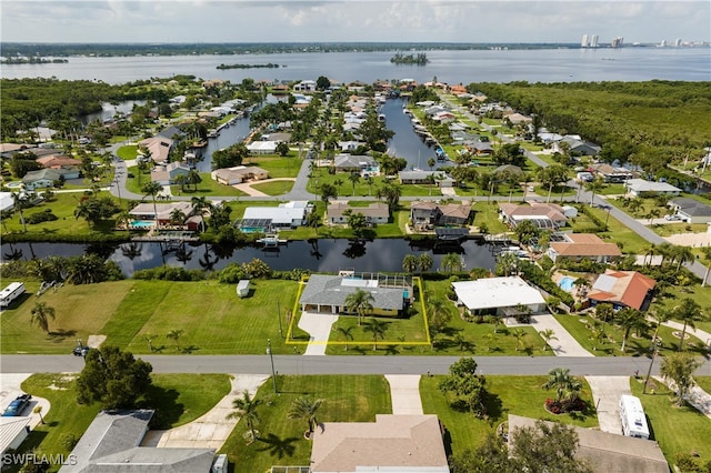 drone / aerial view with a water view