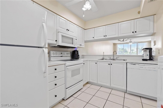 14831 Park Lake Dr Unit 309, Fort Myers, FL 33919 - kitchen featuring a sink, ceiling fan, white cabinetry, and white appliances