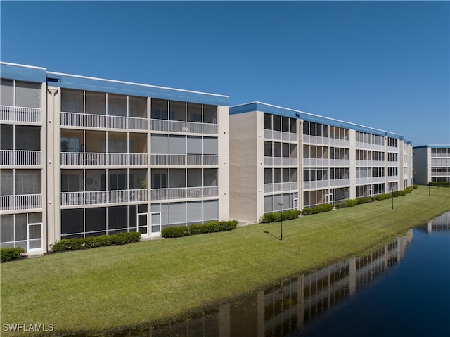 view of property with a water view